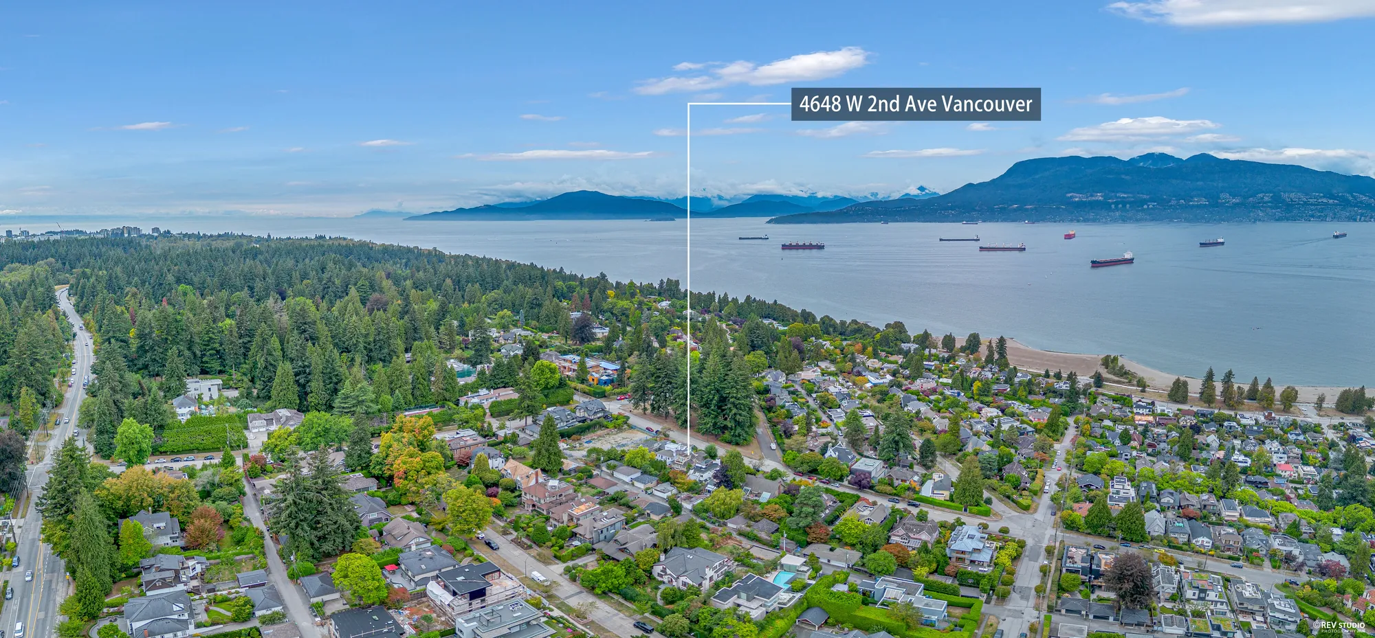 A second aerial panorama with the property marked, showing the block and the water beyond