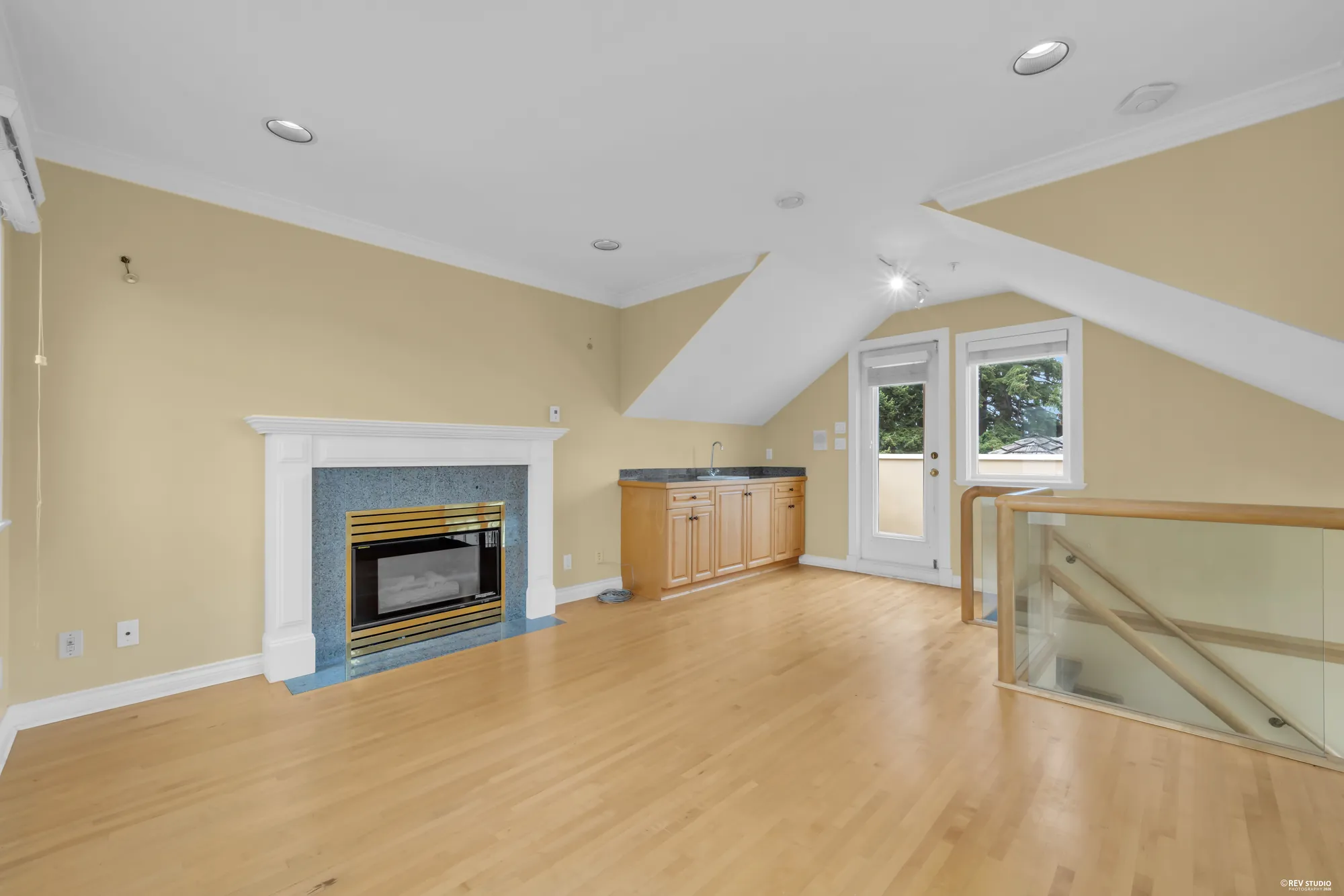 The top floor looking toward the stair and built-in cabinetry